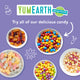 Graphic of assorted YumEarth candies in bowls with text “Try all of our delicious candy” on a purple background.