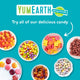 Colorful bowls of YumEarth candy on a teal background with “Try all of our delicious candy.”