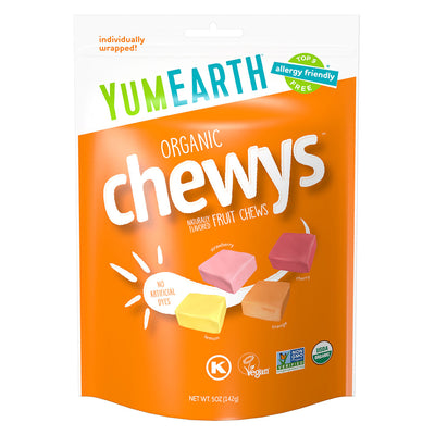 Front of YumEarth Chewys orange pouch with individually wrapped fruit chews, labeled free from artificial dyes and allergy‑friendly.