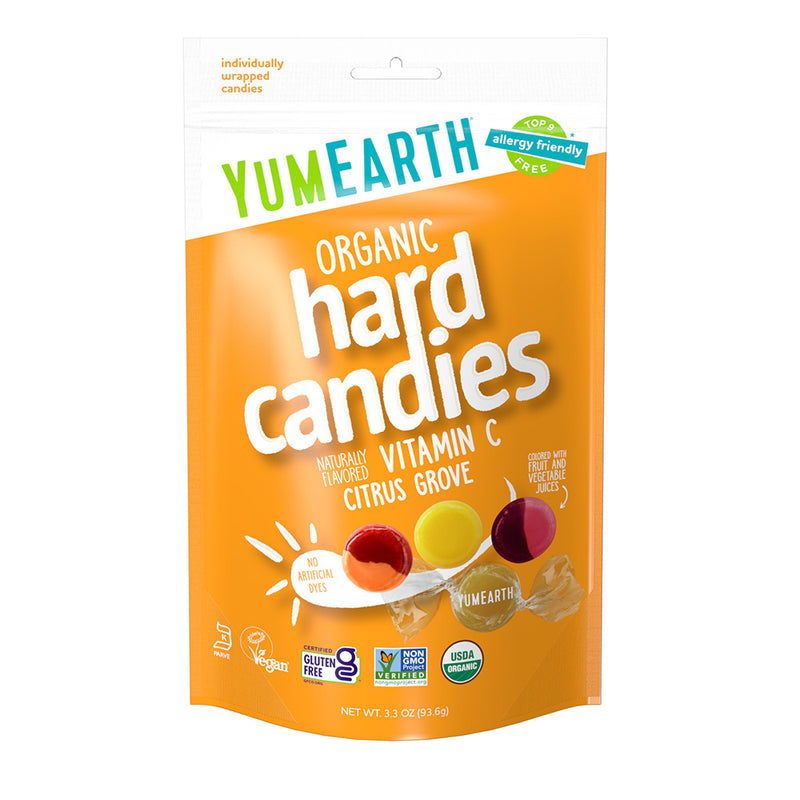Side panel of an orange‑pack YumEarth Hard Candies box showing ingredient list and icons for being free from the top common allergens.